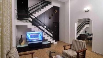 Flat-screen TV, fireplace