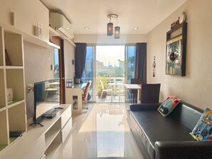 Exclusive 2 Bedroom Apartment (52A) | Living area | 40-inch LED TV with digital channels, TV - Baan Sabai Rama IV  (Bangkok)