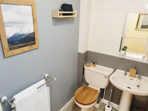 Combined shower/tub, hair dryer, towels, soap