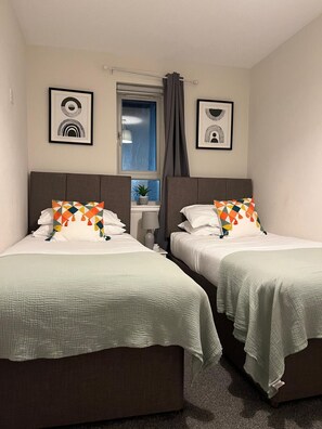 2 bedrooms, iron/ironing board, travel cot, WiFi