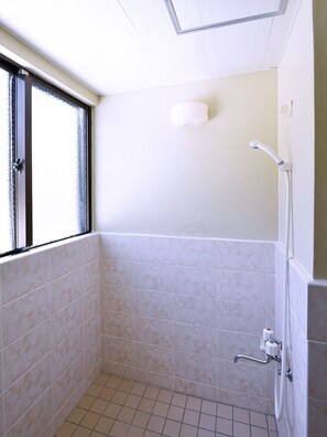 Apartment | Bathroom | Separate tub and shower, free toiletries, hair dryer, bidet - Bay Side Okinawa (Onna)