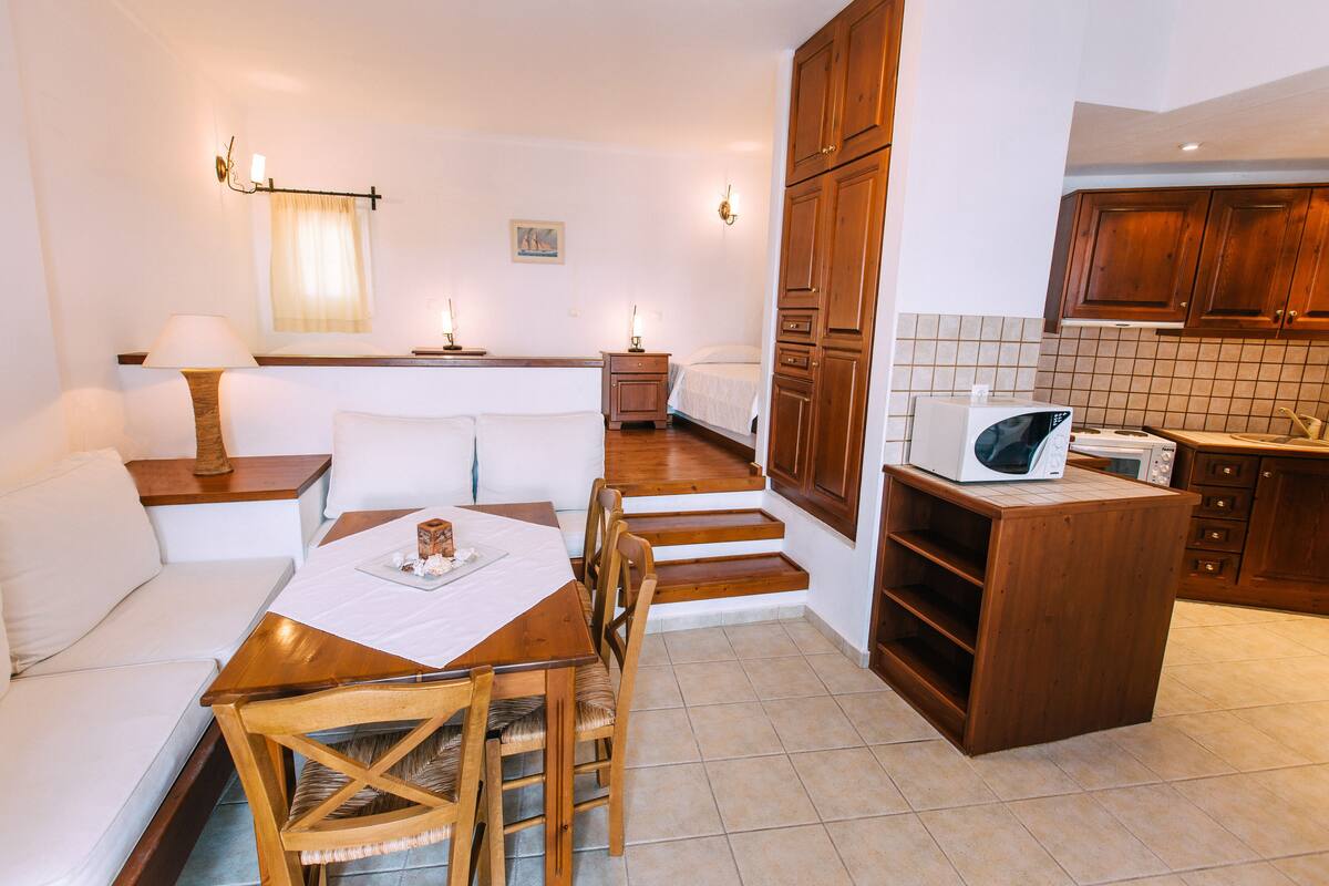 Family Apartment, Sea View, Ground Floor | Living room | 32-inch flat-screen TV with cable channels, TV