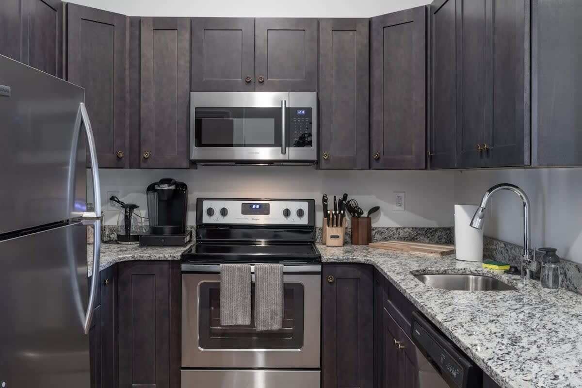 Coffee/tea maker, fridge, microwave, oven