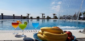 Seasonal outdoor pool, pool loungers