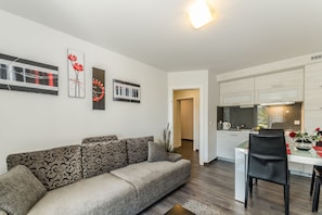 Superior Apartment | Living area | Smart TV