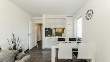 Deluxe-Apartment | Wohnbereich | Smart-TV