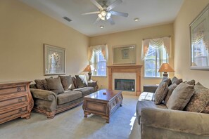 TV, fireplace, books