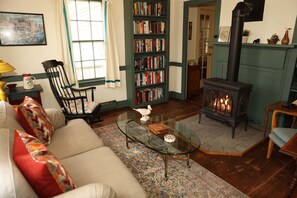 Smart TV, fireplace, DVD player, books