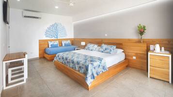 Deluxe Room, Balcony, Pool View | Minibar, in-room safe, desk, blackout curtains