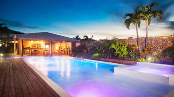 Outdoor pool, open 7:00 AM to 8:30 PM, pool umbrellas, pool loungers