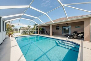 Outdoor pool, a heated pool - Saltwater heated pool,dock/ deck on canaL,GULF ACCESS,fishing- NEAR beaches. (Cape Coral)