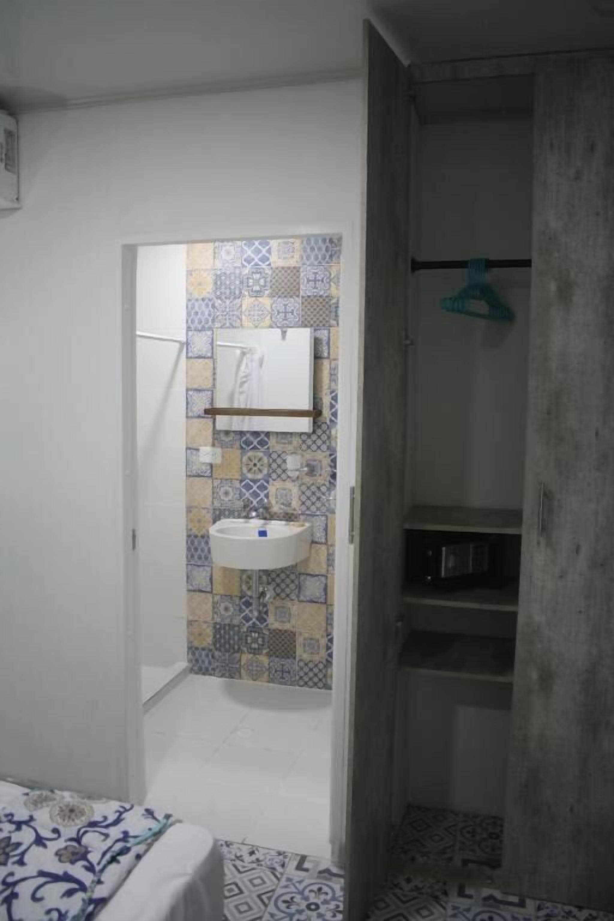 Shower, towels, soap, toilet paper