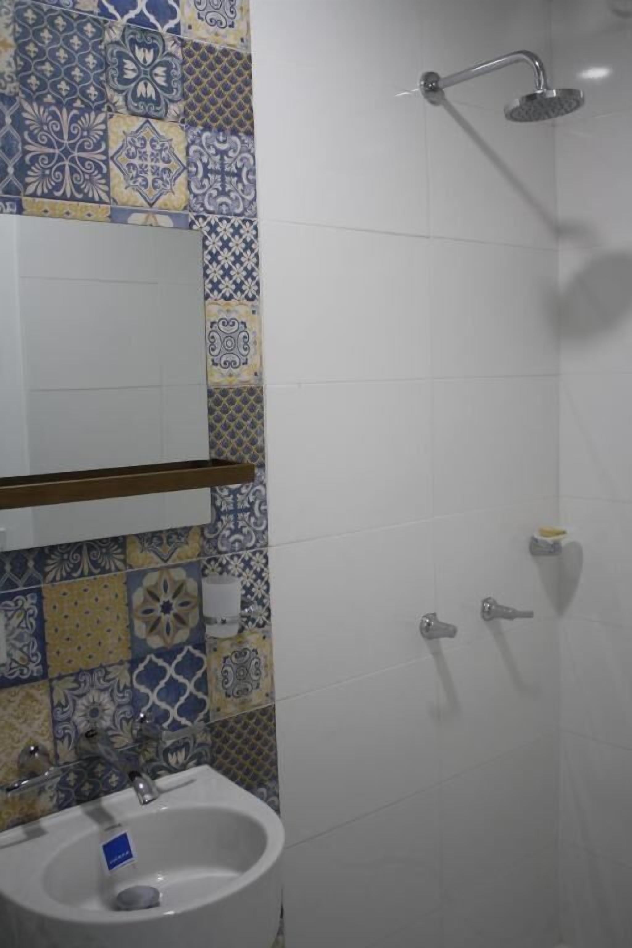 Shower, towels, soap, toilet paper