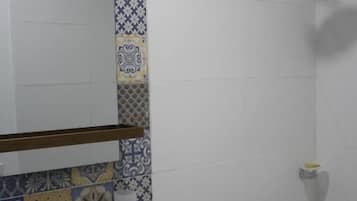 Shower, towels, soap, toilet paper