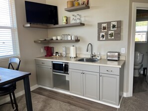 Fridge, microwave, coffee/tea maker, toaster