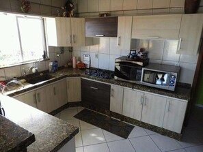 Fridge, microwave, oven, cookware/dishes/utensils