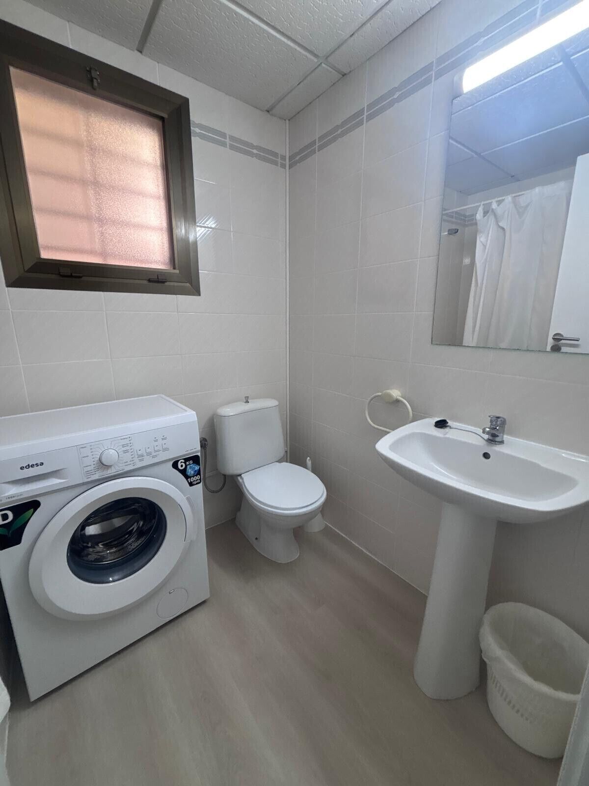 Bathtub, hair dryer, towels