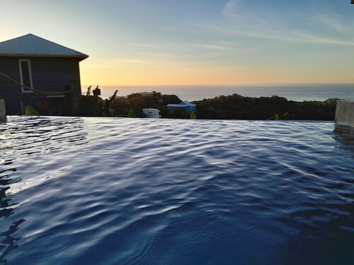 Poolhouse overlooking the Caribbean Sea