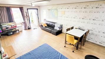 Grand Room (Chamomile) | Premium bedding, laptop workspace, blackout drapes, free WiFi