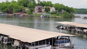 A marina with covered docks and boats. - LAKEFRONT End Unit Condo at 3 Seasons @ 21MM  (Osage Beach)