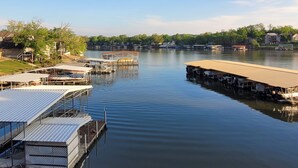 A marina with docks and covered areas. - LAKEFRONT End Unit Condo at 3 Seasons @ 21MM  (Osage Beach)