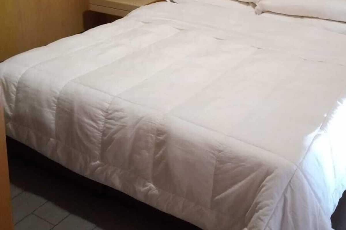 Blackout curtains, free WiFi, bed sheets