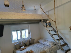 Iron/ironing board, travel crib, free WiFi, bed sheets