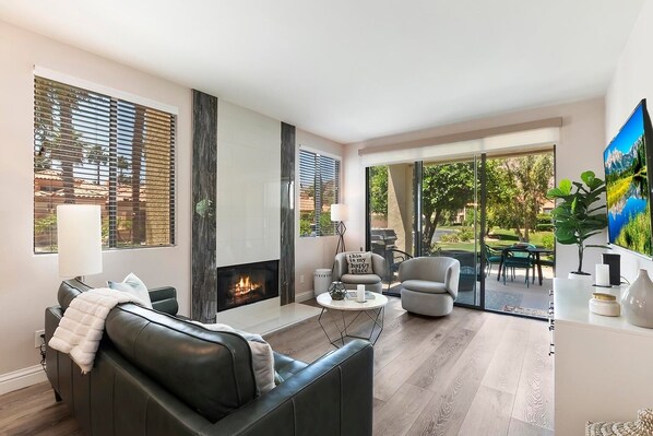 Smart TV, fireplace, DVD player, books