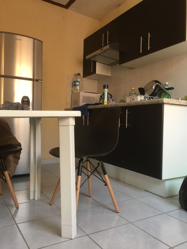 Fridge, microwave, coffee/tea maker, toaster