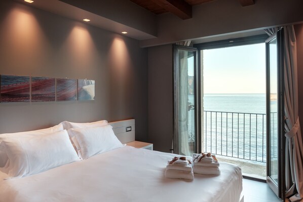 Deluxe Room, Balcony, Sea View | Premium bedding, memory foam beds, minibar, in-room safe