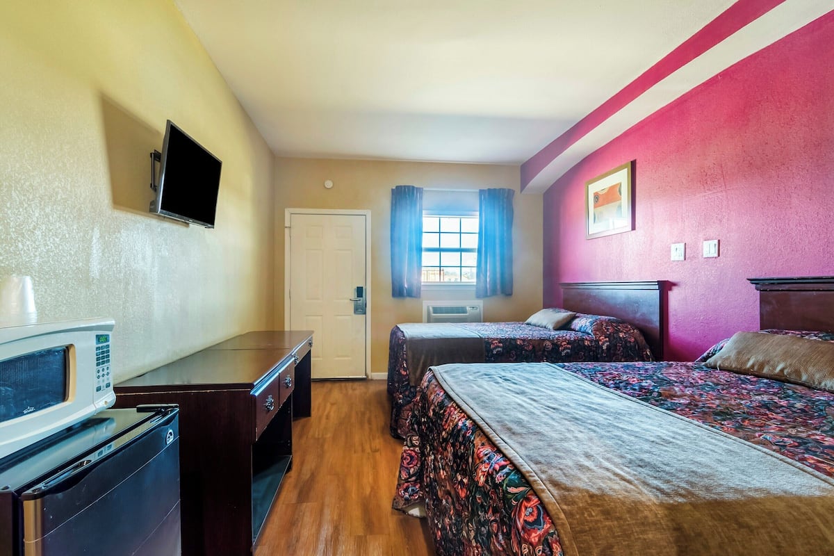 Room, 2 Queen Beds | Iron/ironing board, free WiFi, bed sheets