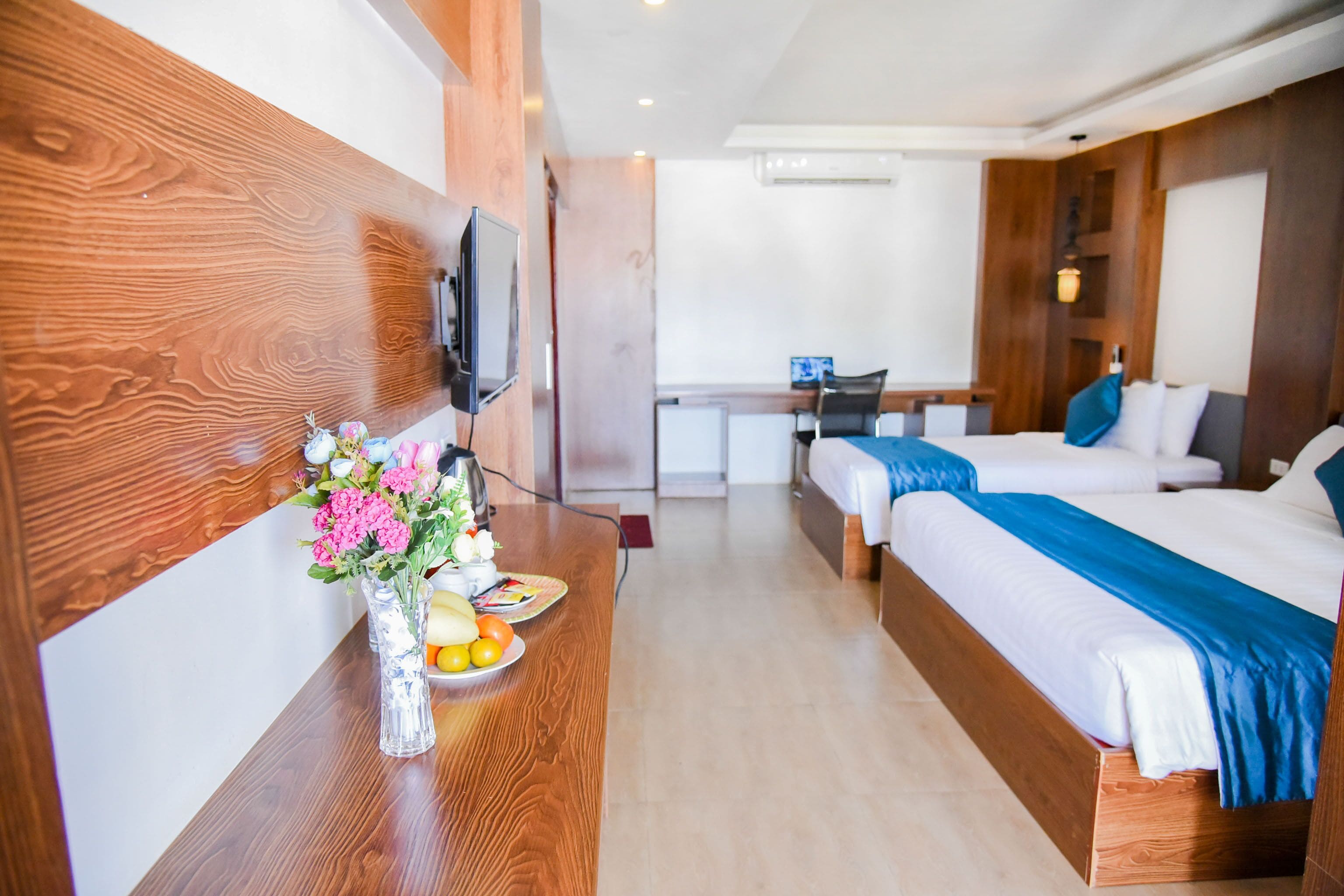 deluxe triple room, mountain view | minibar, in-room safe, blackout curtains, soundproofing