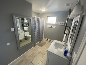 Shower, hair dryer, towels, soap
