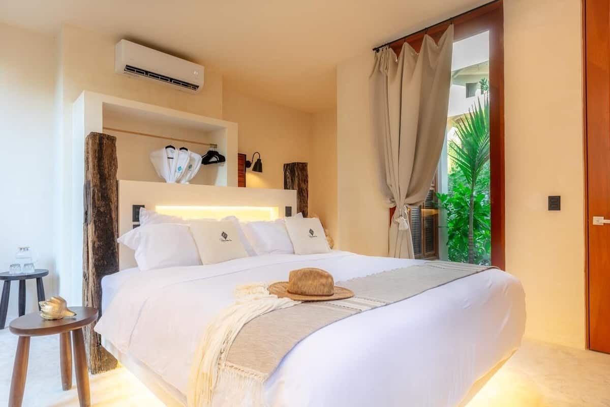 Junior Room, Garden View | 3 bedrooms, premium bedding, in-room safe, individually decorated