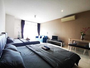 Studio in the Sky (B-36-18) | Blackout drapes, iron/ironing board, bed sheets