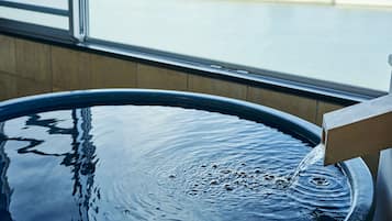 Deluxe Japanese-Western Room, Non Smoking (With Natural Hot Spring View bath) | Bathroom | Hair dryer, slippers, towels