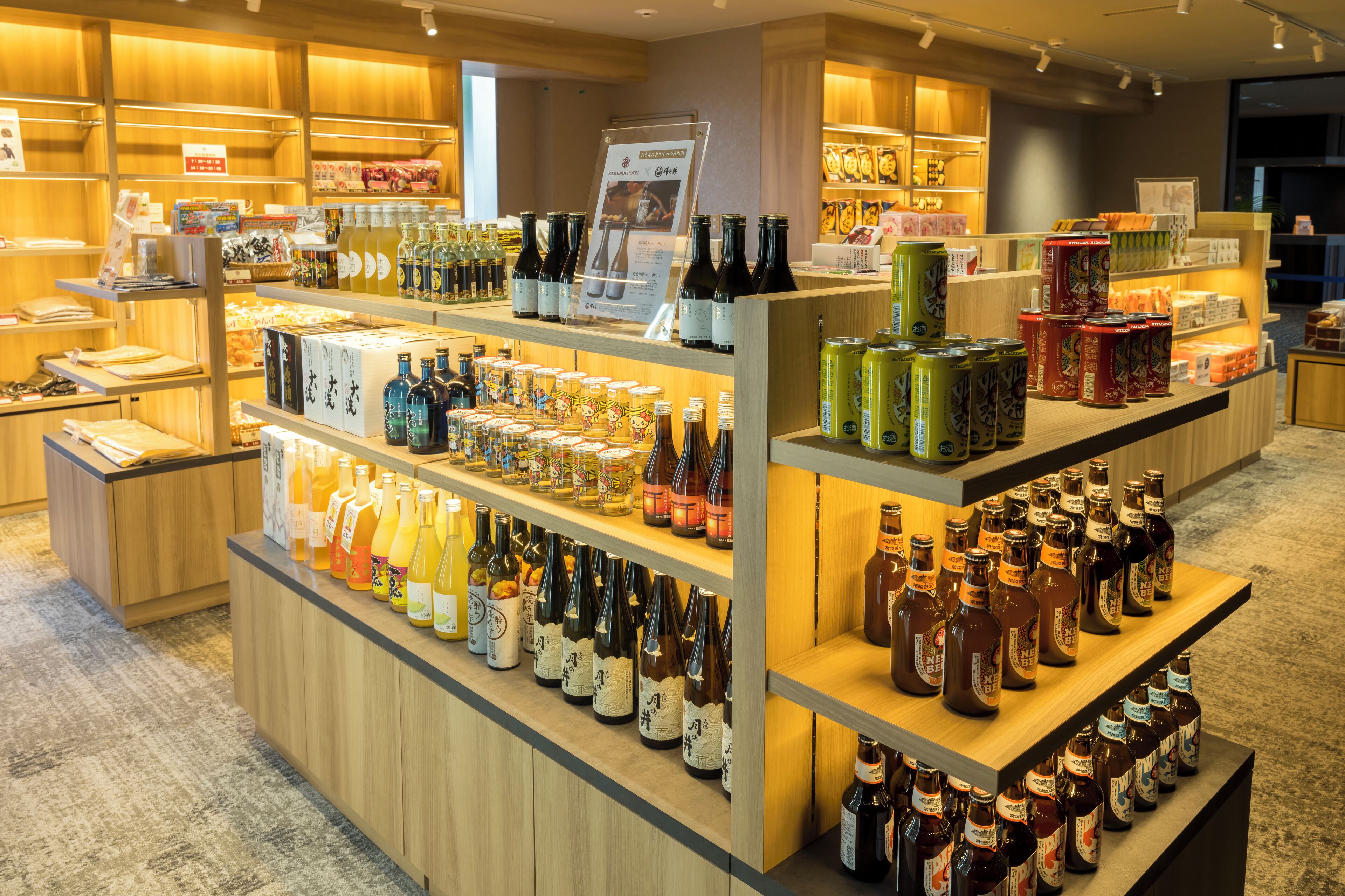 A liquor store with shelves stocked with various bottles and cans.