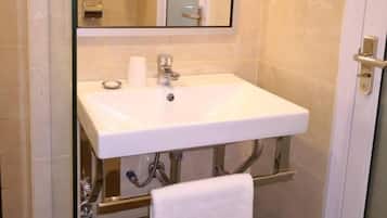 Shower, free toiletries, hair dryer, slippers