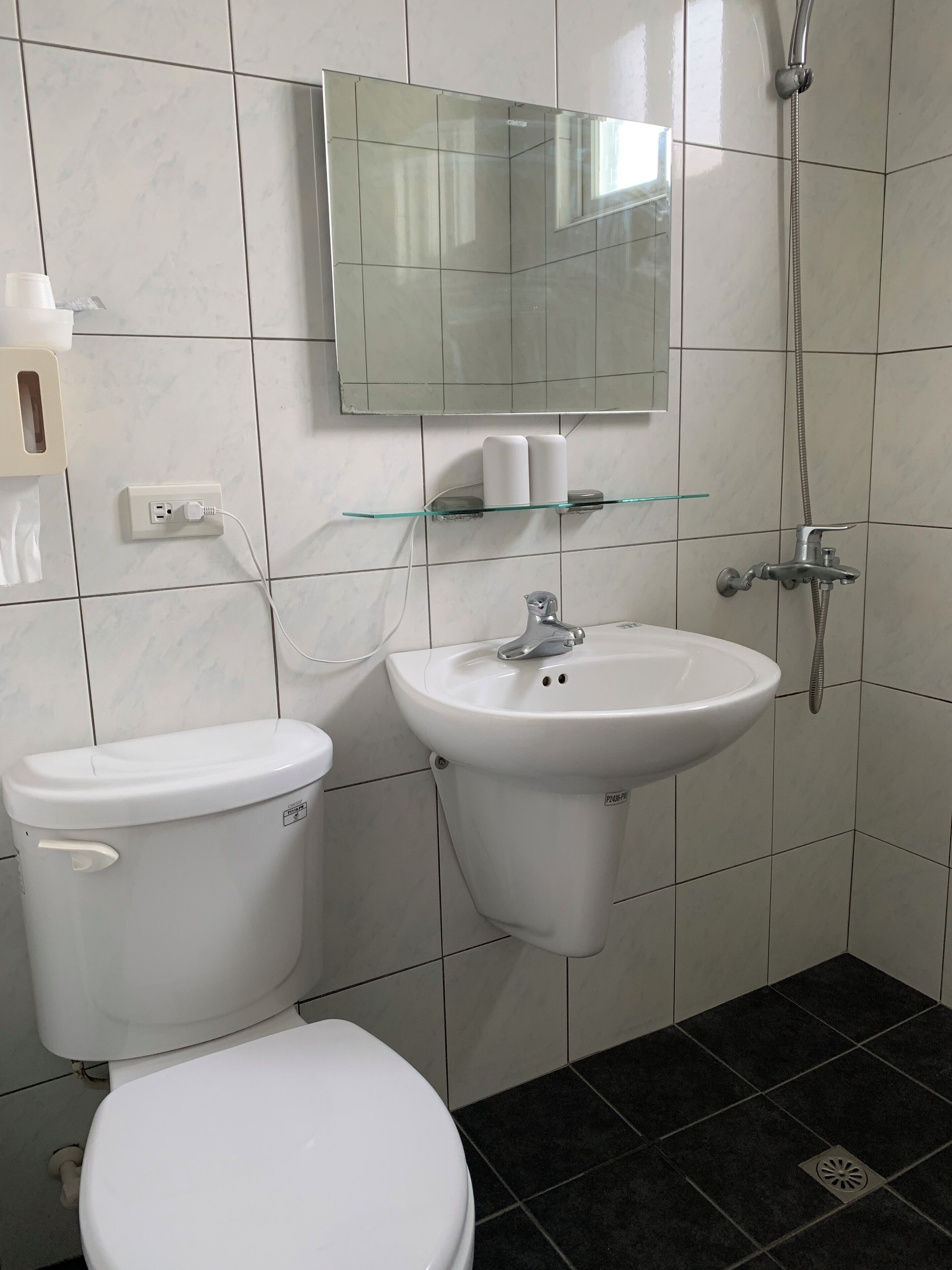 economy double room | bathroom | shower, free toiletries, hair dryer, slippers