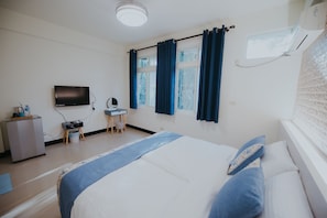 Desk, blackout curtains, free WiFi, bed sheets