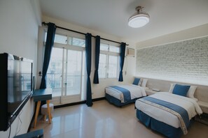 Desk, blackout curtains, free WiFi, bed sheets