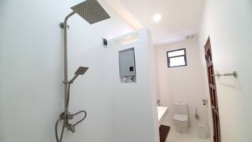 Shower, free toiletries, hair dryer, slippers