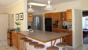 Family Bungalow, 2 Bedrooms, Garden View | Private kitchen - Tsitsikamma Sunrise Caravan Park (The Crags)