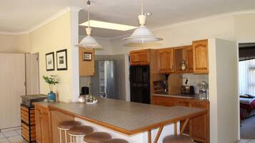 Family Bungalow, 2 Bedrooms, Garden View | Private kitchen | Full-sized fridge, oven, stovetop, toaster