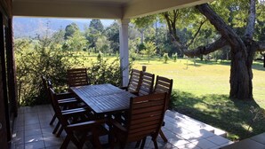 Family Bungalow, 2 Bedrooms, Garden View | Terrace/patio - Tsitsikamma Sunrise Caravan Park (The Crags)
