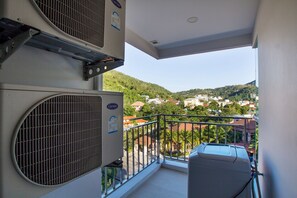 Deluxe-Apartment, 1 Schlafzimmer | Balkon