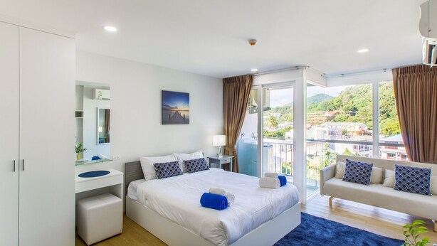 Apartamento luxo, 1 quarto | 1 quarto, cortinas blackout, Wi-Fi de cortesia, roupa de cama