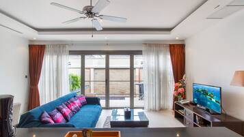 Deluxe House, 1 Bedroom | Living area | Smart TV
