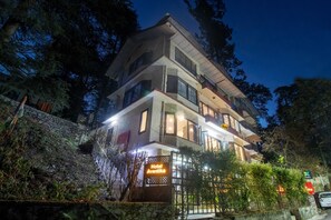 Front of property - evening/night - Itsy Hotels Avantika With Forest View (Shimla)
