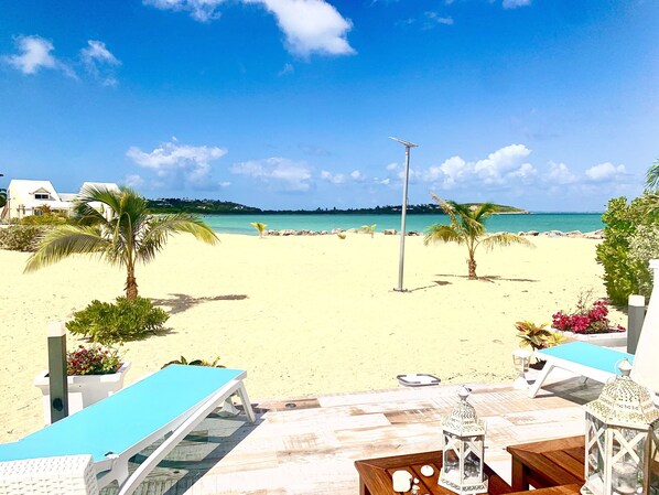 On the beach, sun loungers, beach towels